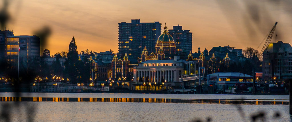 Downtown Victoria BC Harbor at Sunrise. Looking at the BC Parliament Building.