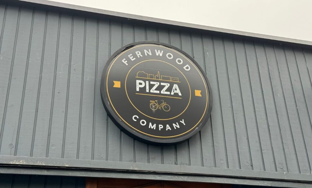 Sign out front of the Fernwood Pizza Company in Victoria, BC